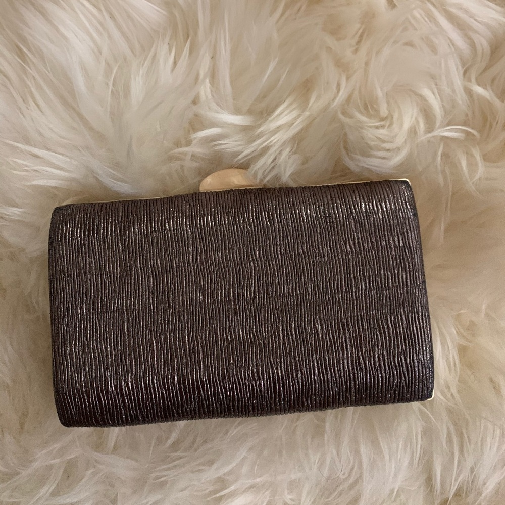 small rectangular shimmery clutch bag
